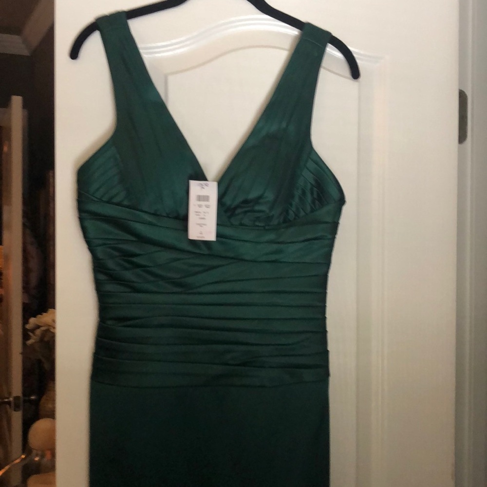 Sleeveless dark green satin dress